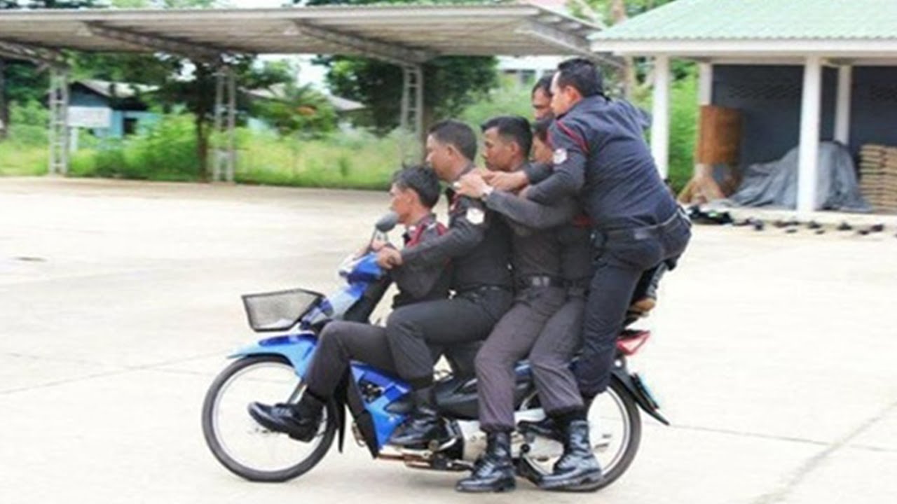 Thai Police on a Motor Bike in Thailand